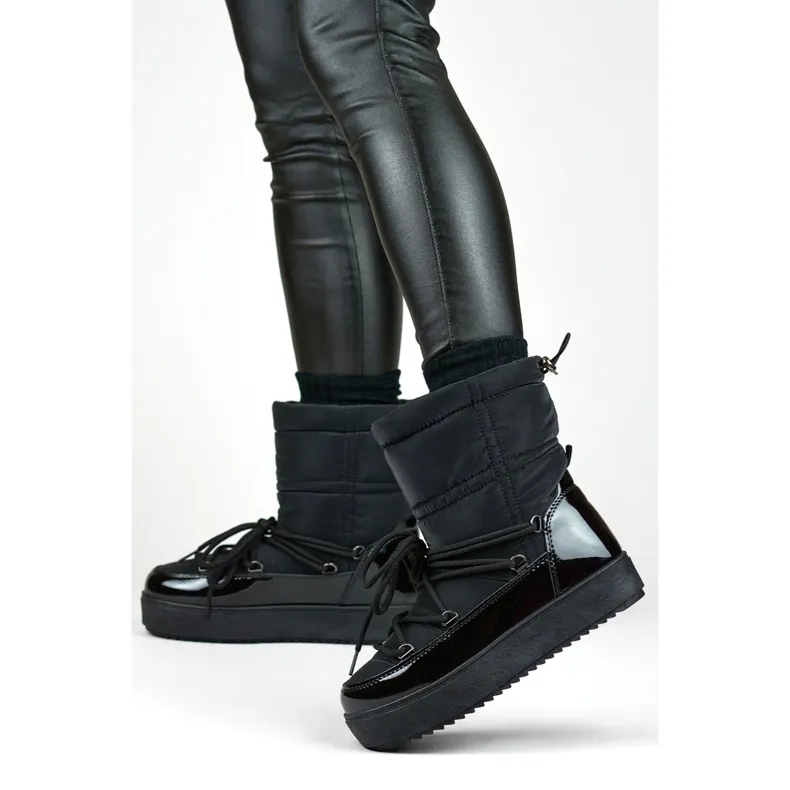 Black women's snow boots with a thick sole, winter shoes