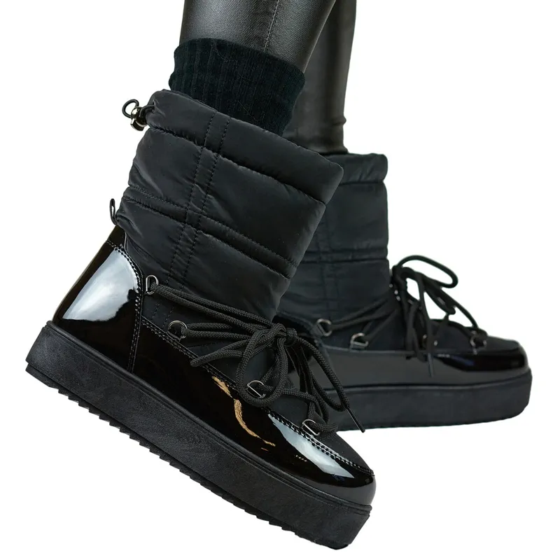 Black women's snow boots with a thick sole, winter shoes